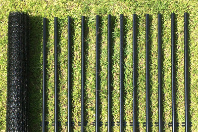 Dog fence posts and netting