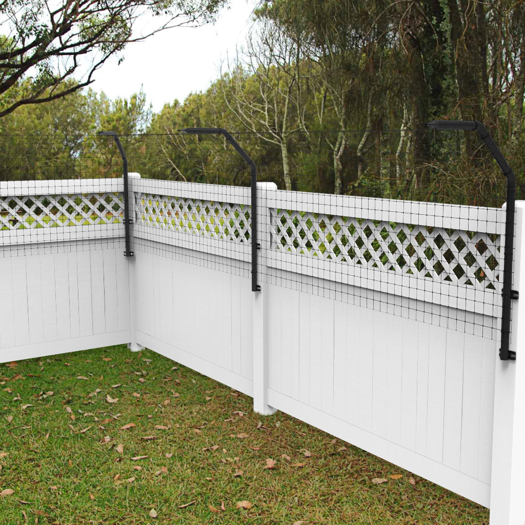 Alternative view of Dog Proofer&#39;s white fence extension arm, for an unobtrusive fence heightening solution.