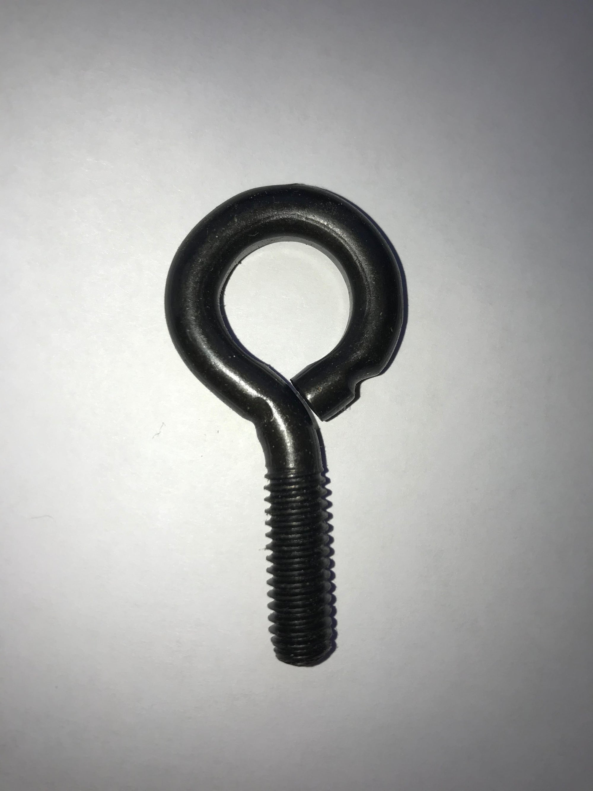 Black eyebolt hardware for fencing installation from Dog Proofer, image illustrates the screw thread and eye loop