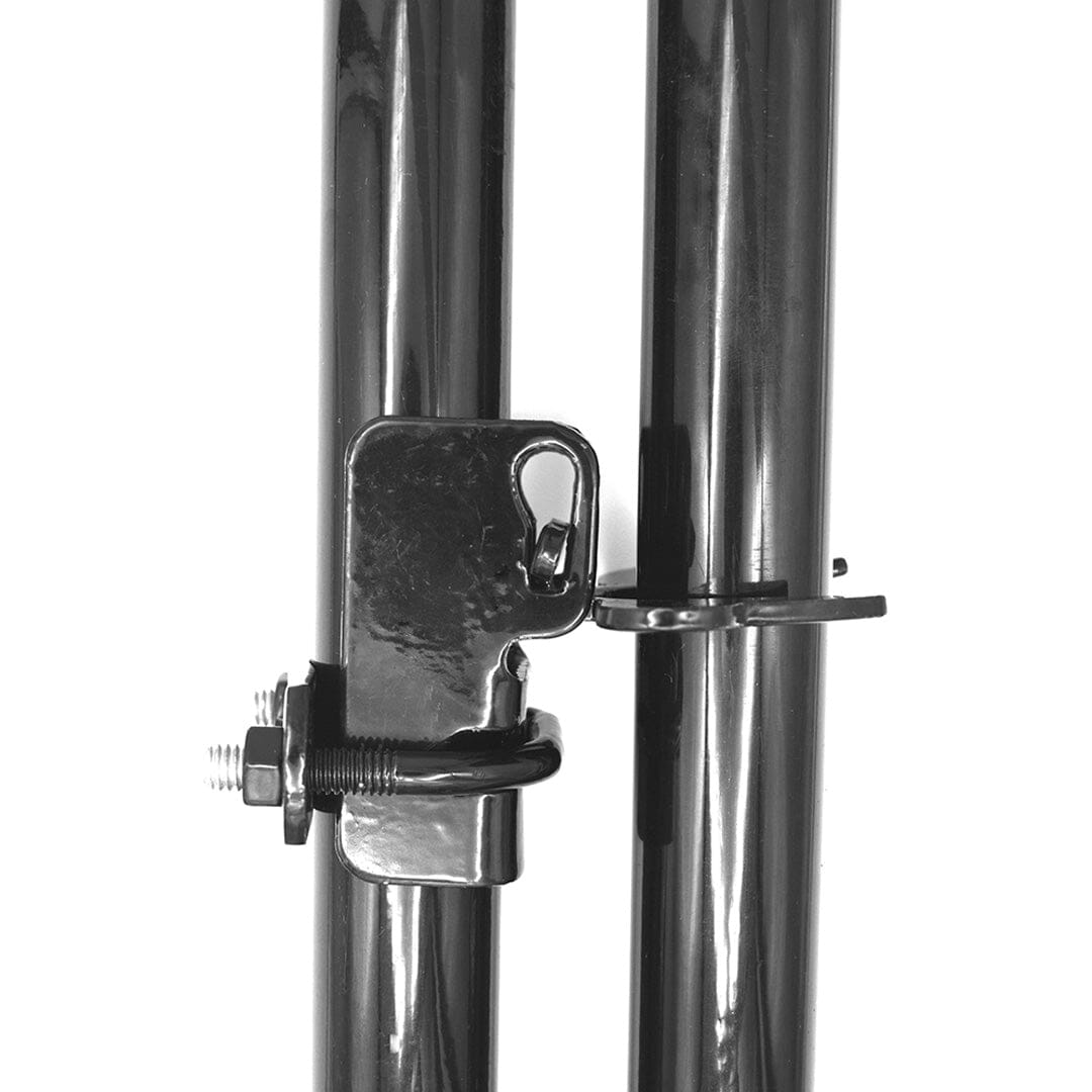 Image of a kennel latch installed on a gate, part of Dog Proofer&#39;s fencing accessories.