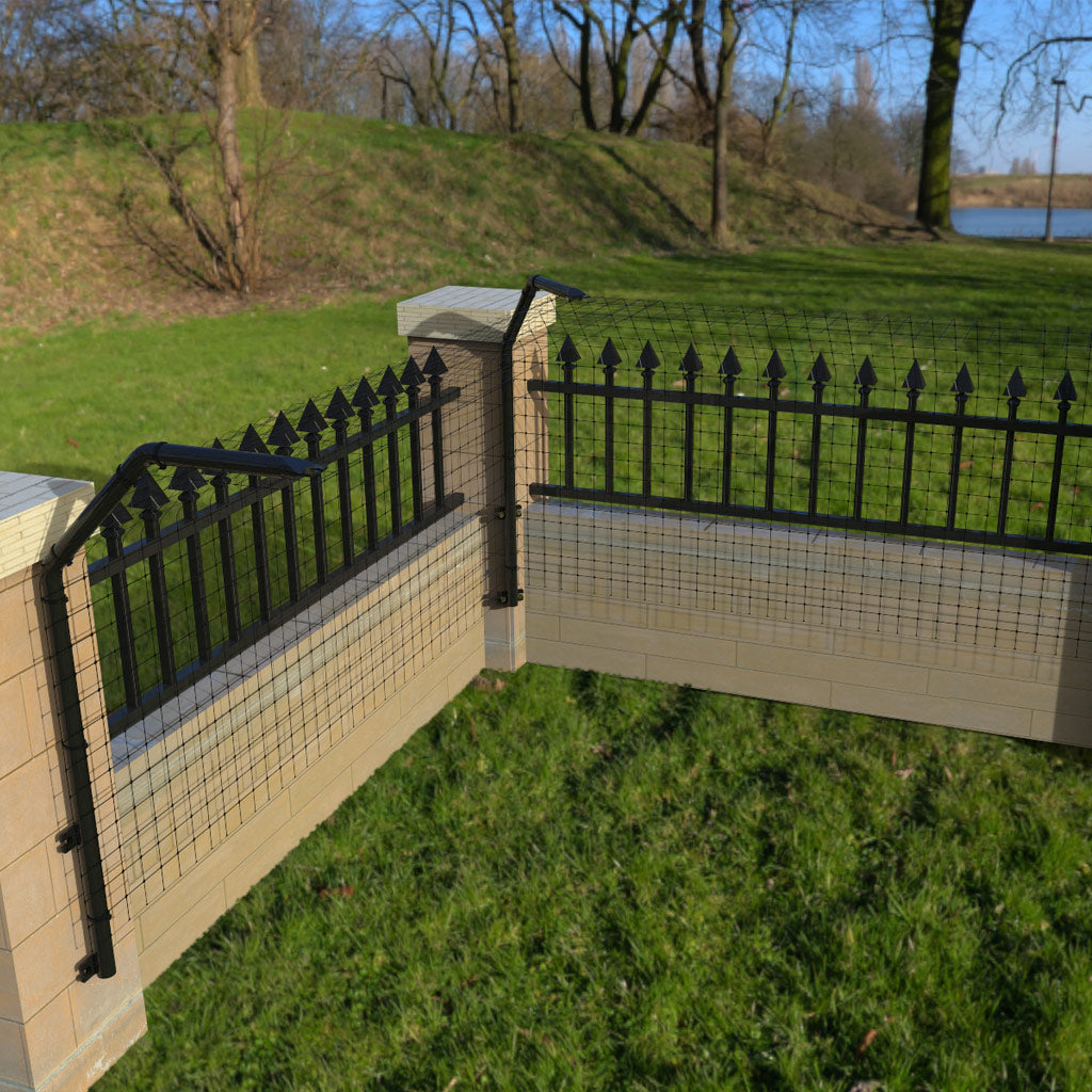 Close-up image of Dog Proofer&#39;s masonry fence extension, preventing pets from leaping over brick walls.